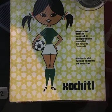 Programa do Mundial de 1971 e a medalha de Leah Caleb